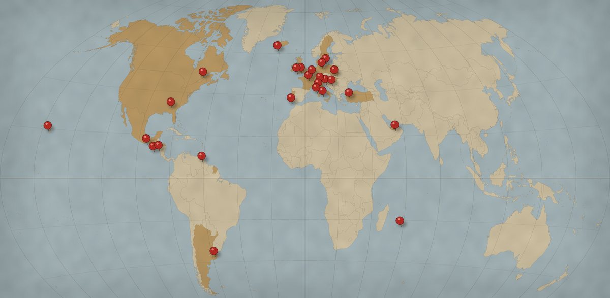 An antique world map with a push pin in each of the 25 countries Alfano Ministries has carried the Gospel to